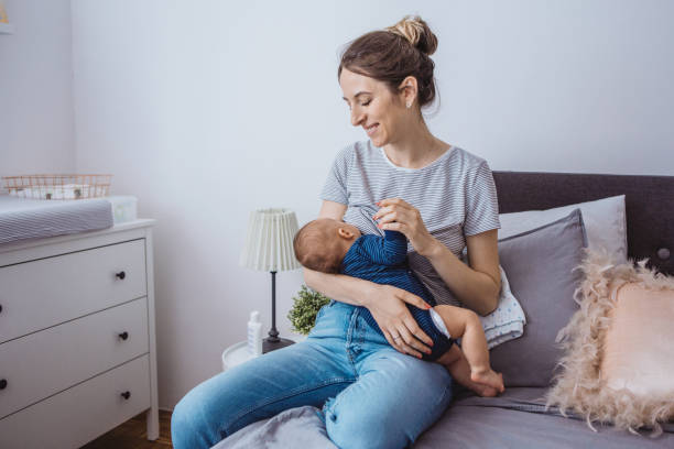 istock Mother breastfeeding baby 1281400527