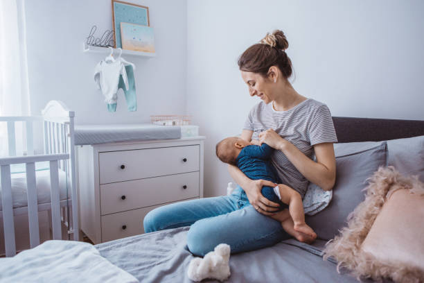 istock Mother breastfeeding baby 1281401135