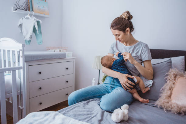 istock Mother breastfeeding baby 1281401165