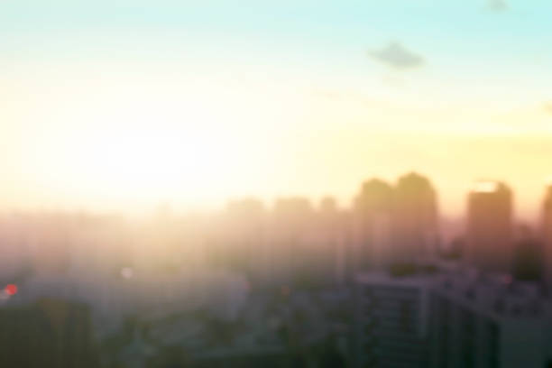 istock blur city skyline landscape sunrise background 1281401957