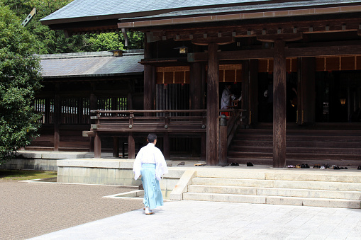 Probably Shinto priest, staff, kannushi, or miko around Miyazaki Jingu Shrine. Taken in August 2019.