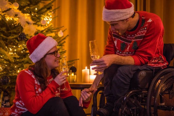 istock Christmas sweaters for disabled couple in xmas home 1281407839