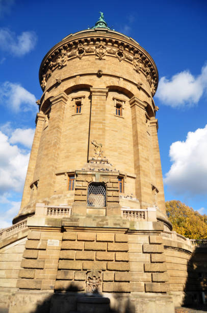 istock Mannheimer Wasserturm Water tower gardens in Friedrichsplatz square public park at Mannheim city in Baden Wurttemberg, Germany 1281408202
