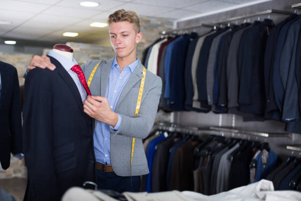 istock man seller measuring business style jacket 1281409297