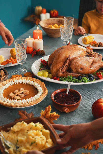 istock Family Having Traditional Holiday Stuffed Turkey Dinner 1281409357