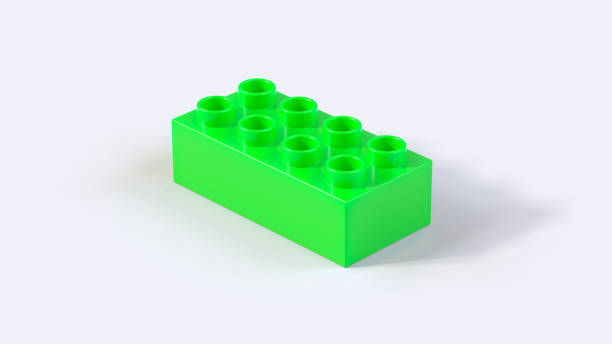istock Ultra Green Plastic Toy Brick on a White Background 1281409766