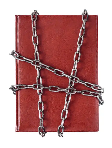 Photo of Chained red book isolated