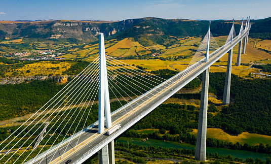 Millau, France - August 11, 2020: Millau Viaduct, cable-stayed road-bridge. Valley of the river Tarn