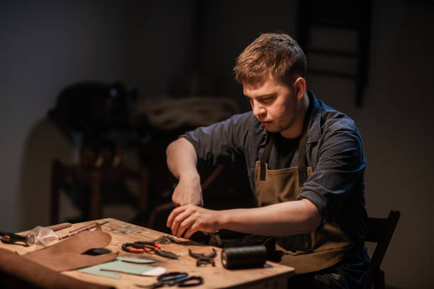 istock a hereditary shoemaker makes shoes from leather in the family workshop 1281412042