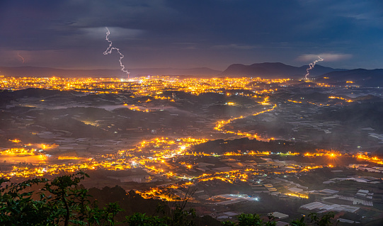 Da Lat city in night, view from Lang Biang mountain peak, Da Lat, Lam Dong province, Central highlands Vietnam