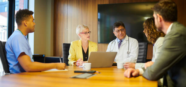 istock medical business meeting 1281413218