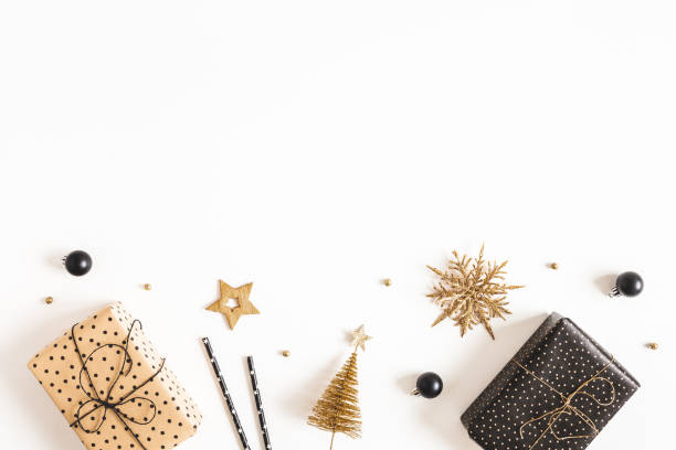 istock Christmas composition. Gift boxes, black and golden decorations on white background. Christmas, winter, new year concept. Flat lay, top view, copy space 1281413449