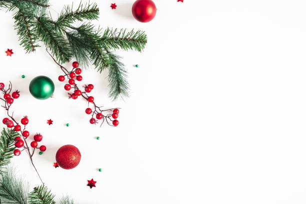 istock Christmas composition. Fir tree branches, red and green decorations on white background. Christmas, winter, new year concept. Flat lay, top view, copy space 1281413452