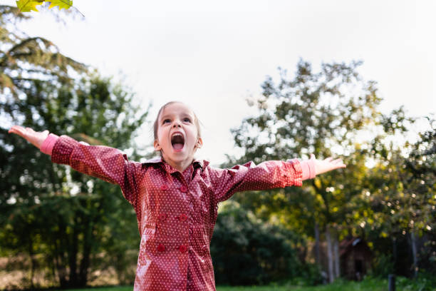 istock Child whit outstretched hands outdoors 1281413912