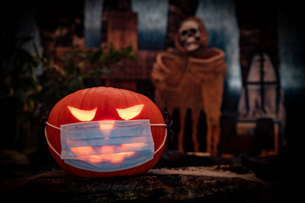 Halloween Scene with a Pumpkin Coronavirus Facemask