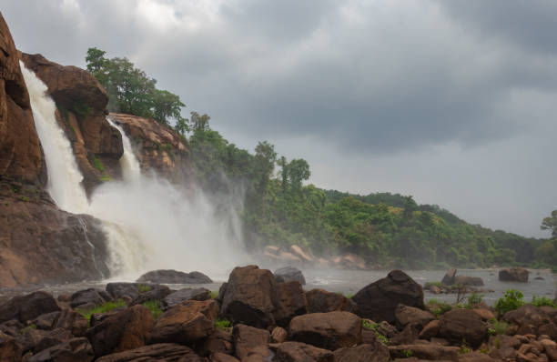 istock waterfall falling from mountain too at morning from low angle 1281421655