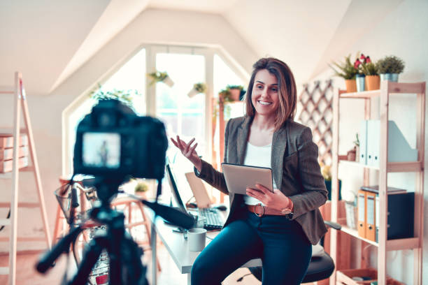 istock Female Making A Vlog About Freelance Working From Home Office 1281422524