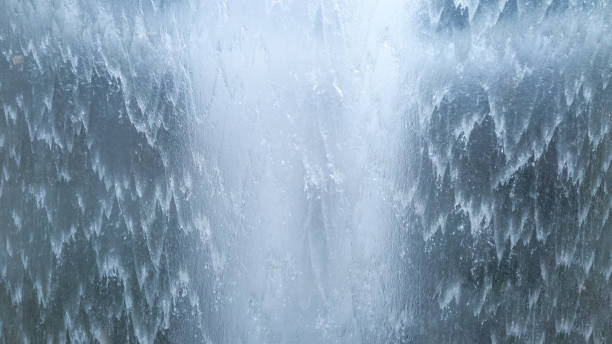 istock Powerful flow of waterfall, closeup. Background from wave nature water stream. 1281422578