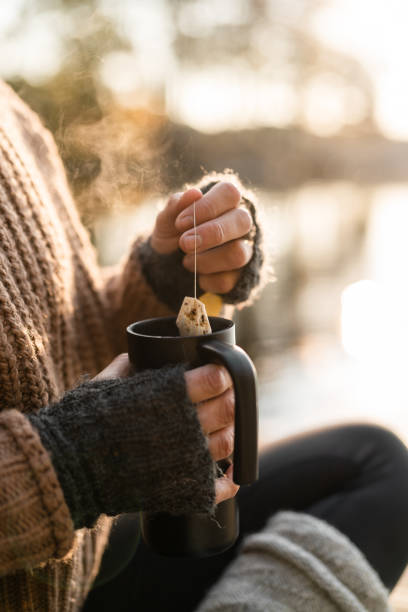 Dipping a teabag in hot water