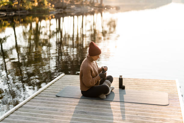 istock Enjoying hot tea in the sun on an autumn day 1281423485