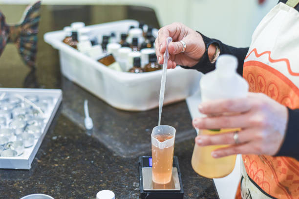 istock Measuring out essential oils for ingriedients to make home made scented candles 1281424919