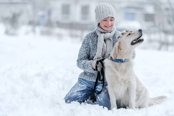 istock Children playing in the snow on a winter day 1281425181