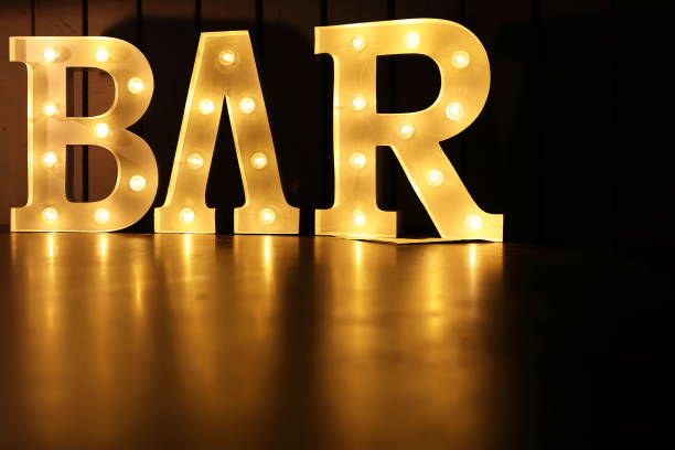 Corona lighted golden bar sign