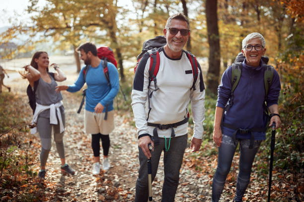 istock An elderly couple at hiking posing for a photo 1281427239