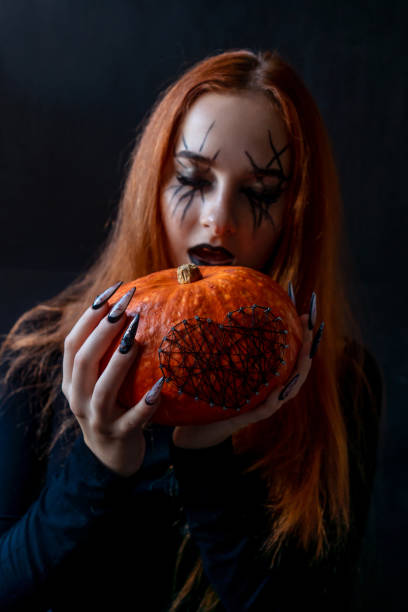 istock Halloween Nail Art Design, hands and decorations. 1281428098
