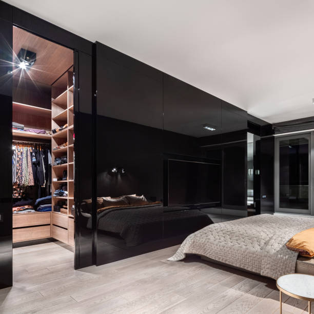 istock Luxury bedroom with walk in closet 1281429359