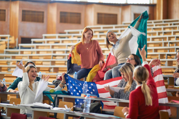istock Students have good time together as part of a student exchange program. Smart young people study at the college. Education, college, university, learning and multiethnic people concept 1281430751