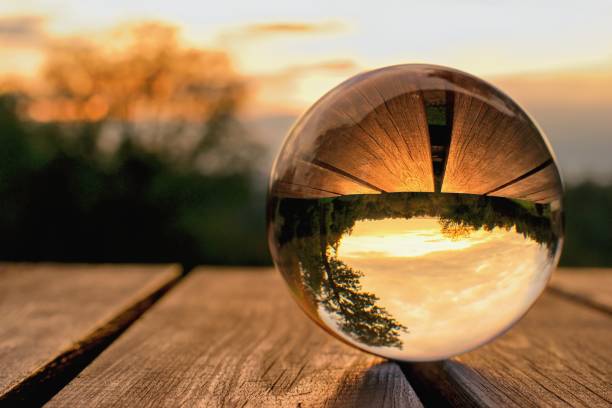 Lens ball creative photography, landscape reflection Lens ball creative photography, landscape reflection crystal ball photos stock pictures, royalty-free photos & images