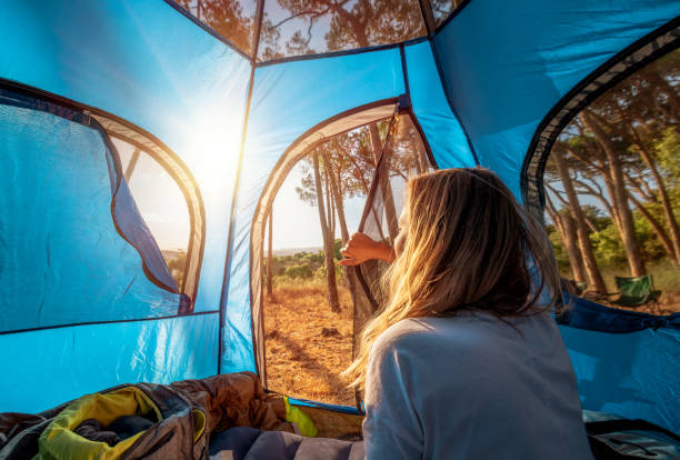 istock Woman at the Camping Site 1281432261
