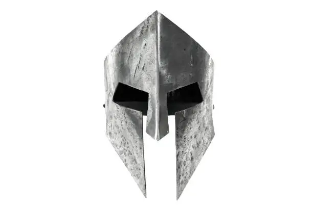 Photo of Ancient iron spartan head protection isolated on white.