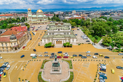 Wide shot of the bulgarian parliament building and Monument to the Tsar Liberator (Bulgarian: Сграда на българският парламент и Паметник на Цар Освободител). The picture was taken at day time with DJI Phantom 4 Pro drone / quadcopter.