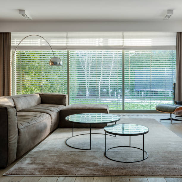 istock Window wall with blinds in living room 1281434219