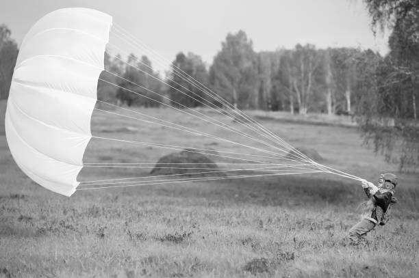 istock Young female pilot parachute 1281435389