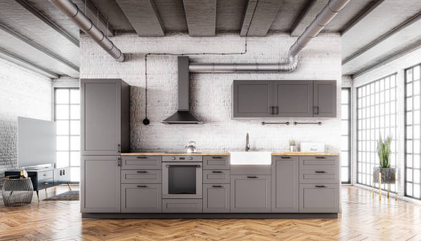 istock Grey Scandinavian open kitchen in a loft interior with a brick wall, parquet floor and a concrete ceiling 1281436041