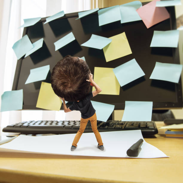 istock Tired man, office worker holding his huge tired head, funny 1281436145