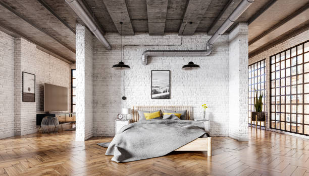 istock Bedroom in a loft interior with a brick wall, parquet floor and a concrete ceiling 1281436841