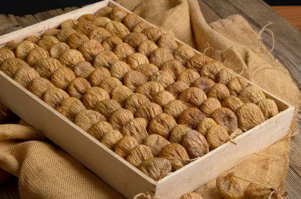 Organic dried figs in a wooden box