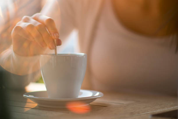 istock Young woman drinking a cup of coffee 1281437391