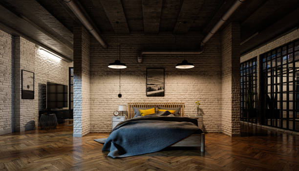 istock Bedroom at night in a loft interior with a brick wall, parquet floor and a concrete ceiling 1281437438
