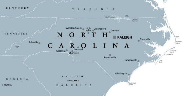 North Carolina, NC, gray political map, Old North State, Tar Heel State North Carolina, NC, gray political map. With capital Raleigh and largest cities. State in the southeastern region of the United States of America. Old North State. Tar Heel State. Illustration. Vector georgia us state stock illustrations