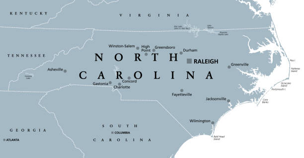 North Carolina, NC, gray political map, Old North State, Tar Heel State North Carolina, NC, gray political map. With capital Raleigh and largest cities. State in the southeastern region of the United States of America. Old North State. Tar Heel State. Illustration. Vector state of north carolina map stock illustrations