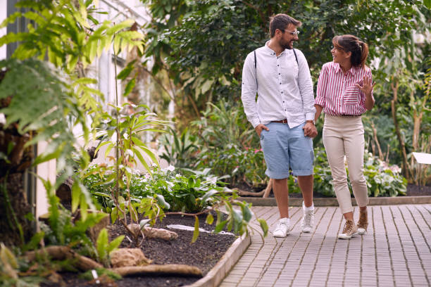 istock Young couple in visit to a botanical garden 1281439841