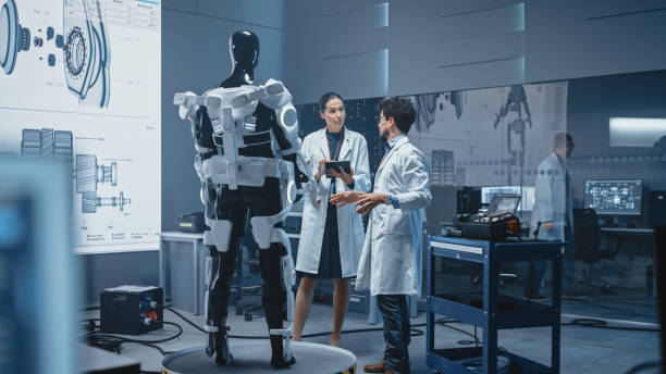 istock In Robotics Development: International Team of Engineers and Scientists Work on Robotics Exoskeleton Prototype. Designing Powered Exosuit to Help Disabled People Walk Hard Labor Workers to Lift Goods 1281439976