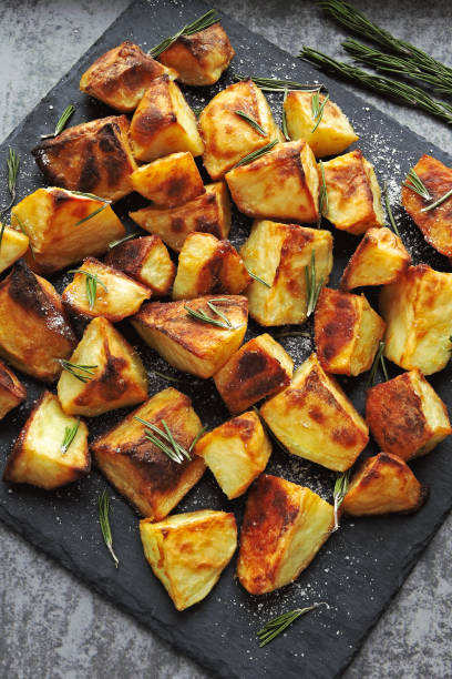 istock Baked potato served on a stone board. 1281440137