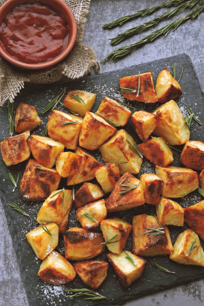 istock Baked potato served on a stone board. 1281440143