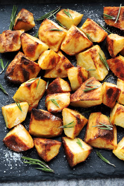 istock Baked potatoes with rosemary and sea salt. 1281440149